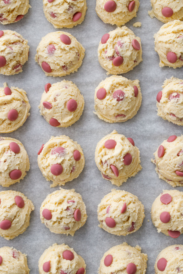 Balls of raw cookie dough waiting to be baked (you can also freeze them for later use!)