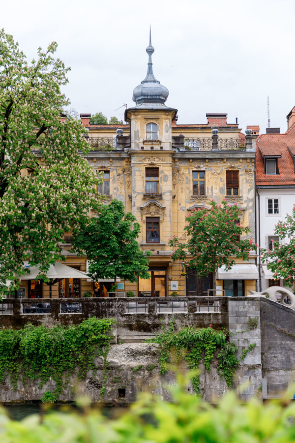 Pastel buildings along the river in Ljubljana, Slovenia