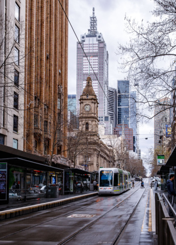 A rainy street in Melbourne, Australia with tram
