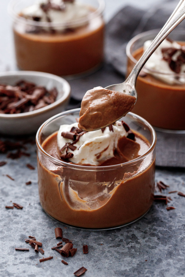 Spoonful of Chocolate Pumpkin Pot de Creme showing the silky smooth texture