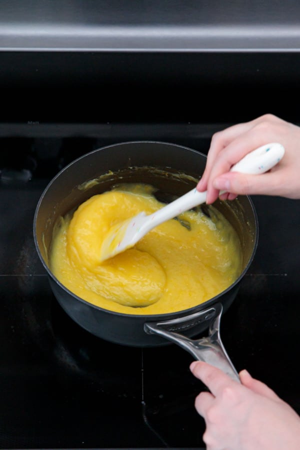 Mixing the butter into the cooked lemon curd.