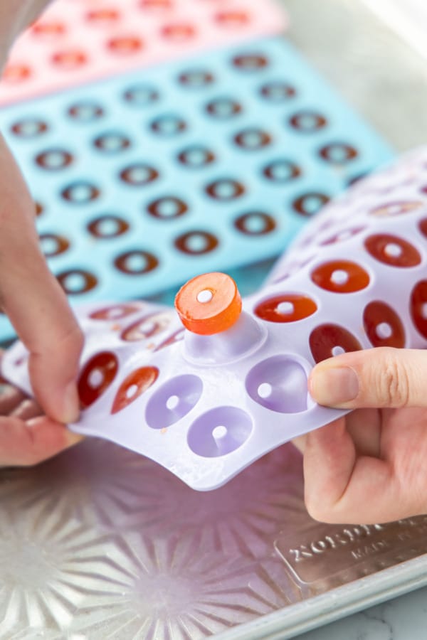 After refrigerating overnight, pop the set gummies out of the silicone molds.