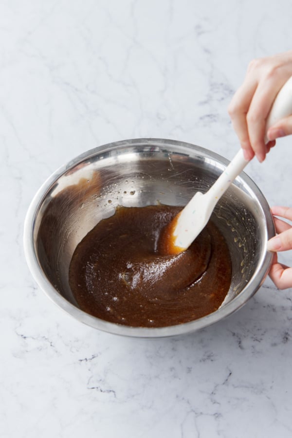 After mixing in the egg the batter will appear smooth and emulsified.