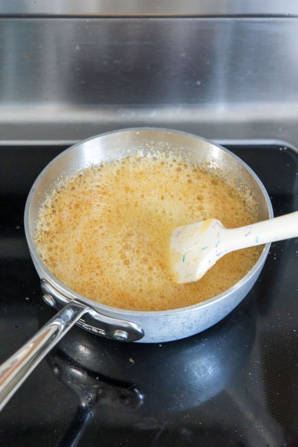 Brown butter foaming up but with a slightly brown tint to the foam.